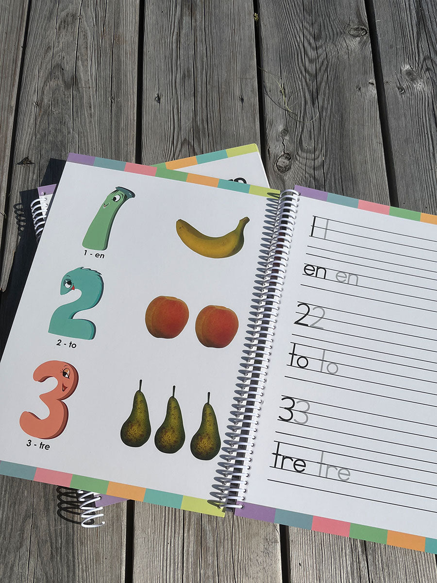 Nærbilde av bok der barna kan lære å skrive tall